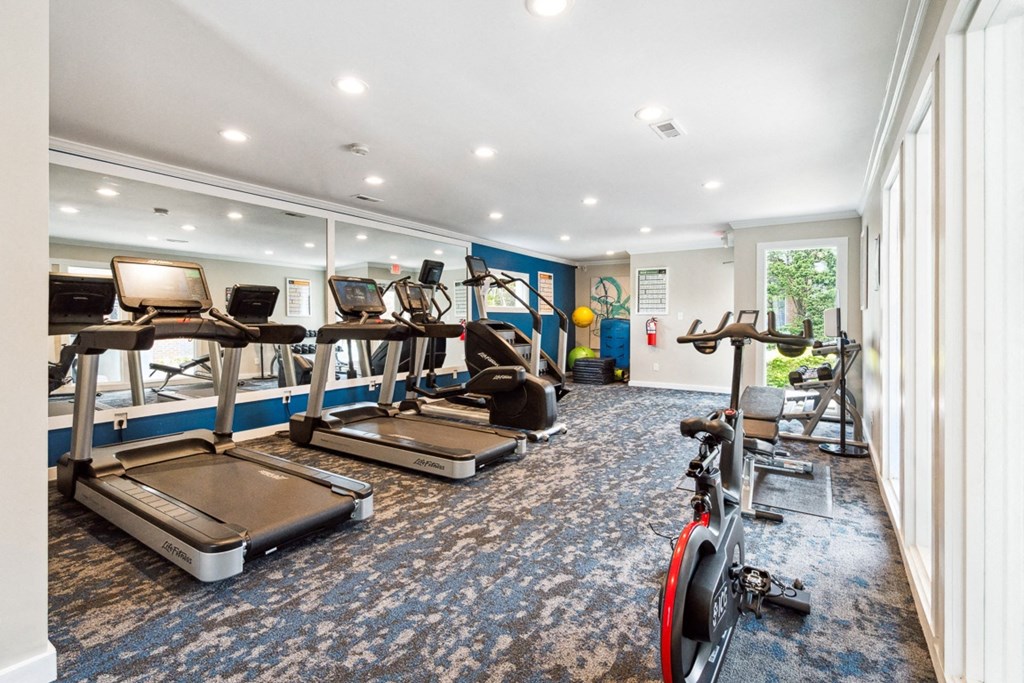 a room filled with lots of exercise equipment