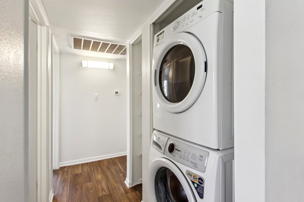 Stacked washer and dryer system in closet at Sundancer Apartments, Arizona, 85353