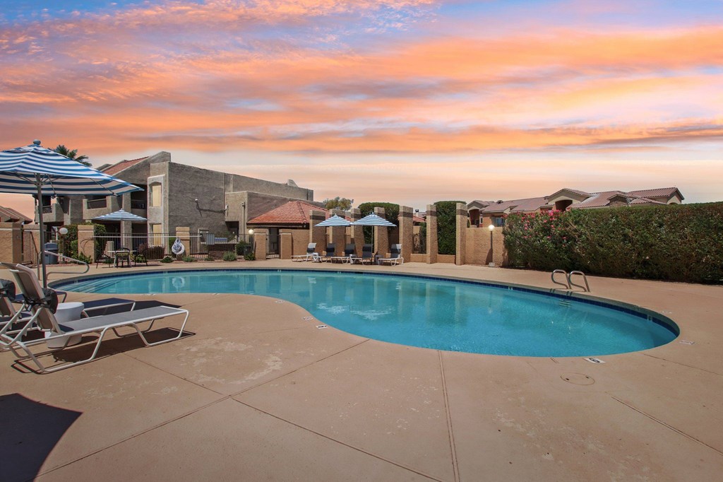 Pool Area with Lounge Chairs at Sundancer Apartments, Arizona