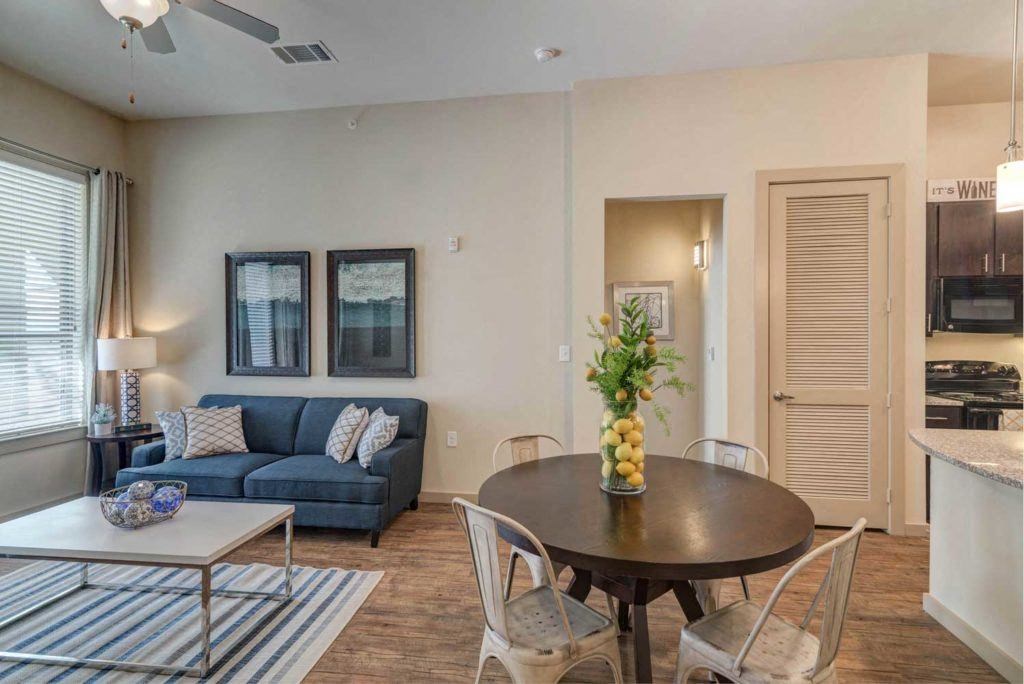 Open Floor Plan - Kitchen to Living Room & Access to Patio at District at Medical Center, San Antonio
