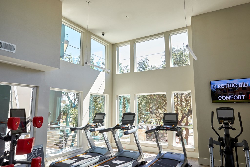 State of the Art Fitness Room With Treadmills at Addison Medical Center Apartments, San Antonio, Texas