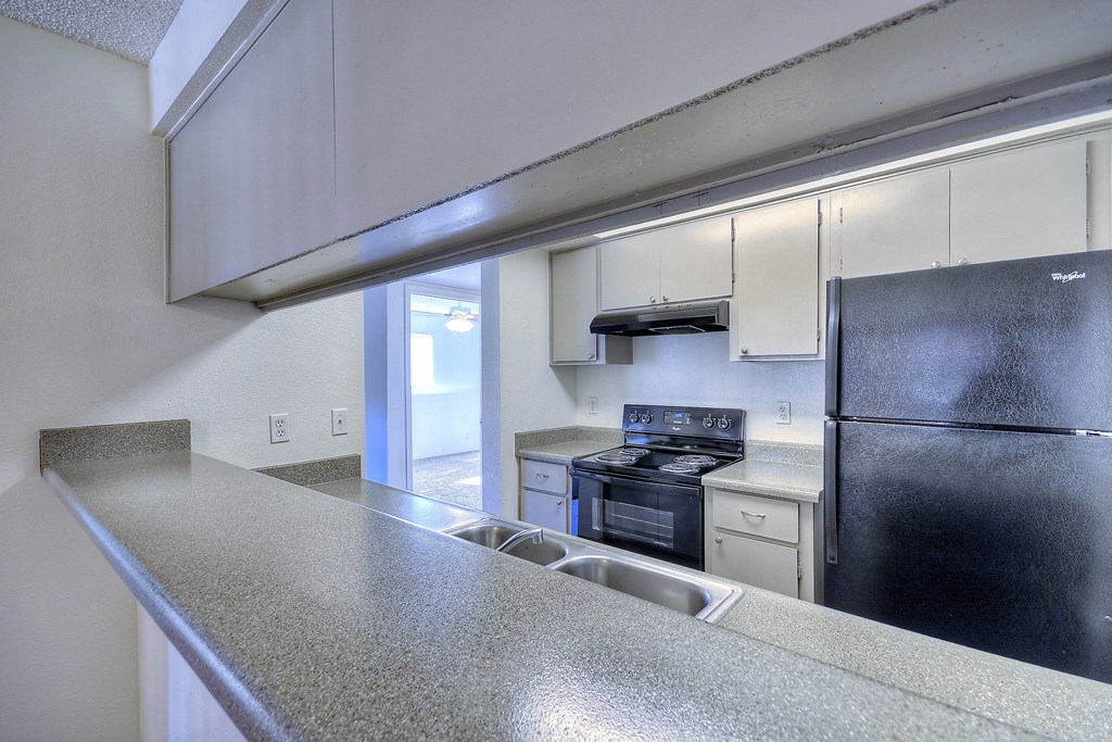 counter top kitchen and a refrigerator