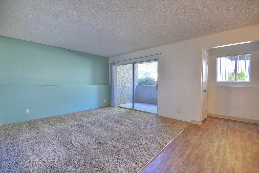 living room with a sliding glass door to a patio