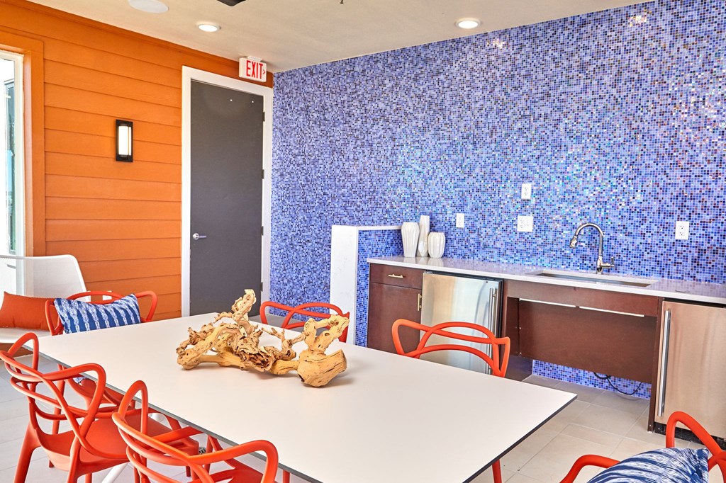 Rooftop Lounge with Patio Seating and Fridge at Addison Medical Center Apartments, Texas, 78229