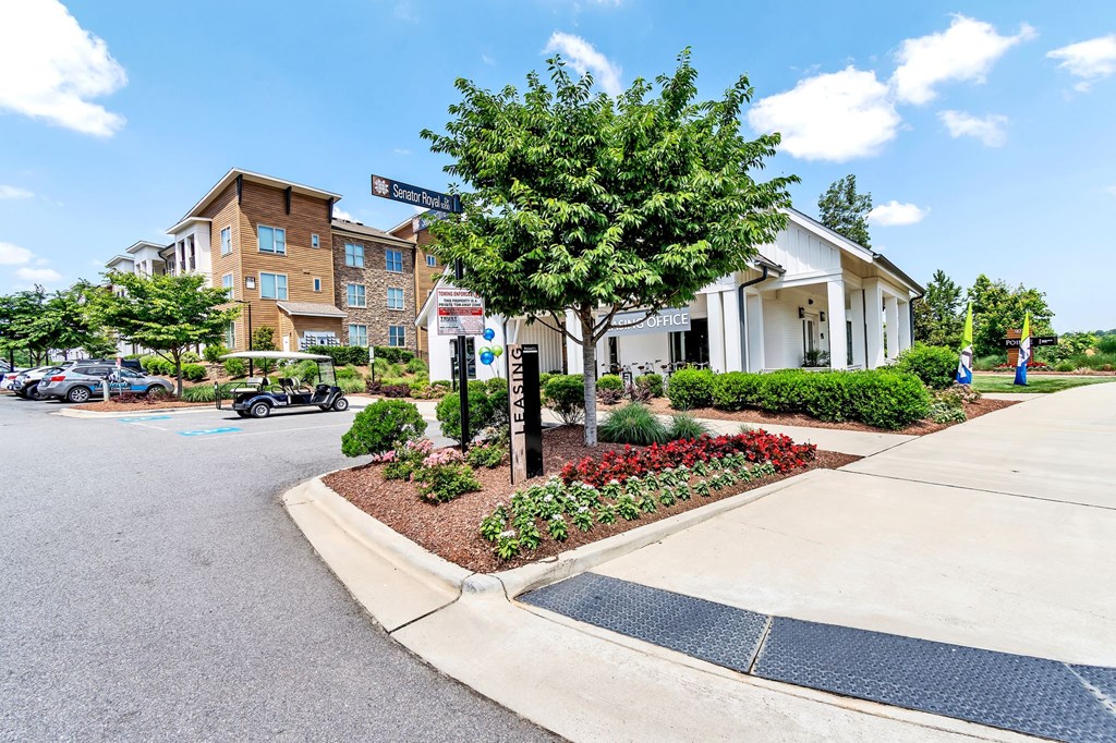 a street corner with a street sign in front of a building