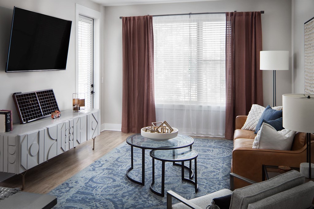 a living room with a couch and a table