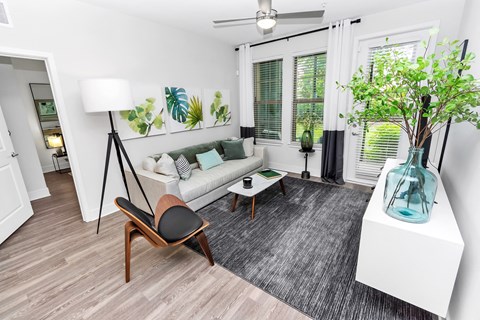a living room with a couch and a table