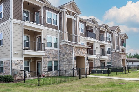 a view of a building with brick and stone walls