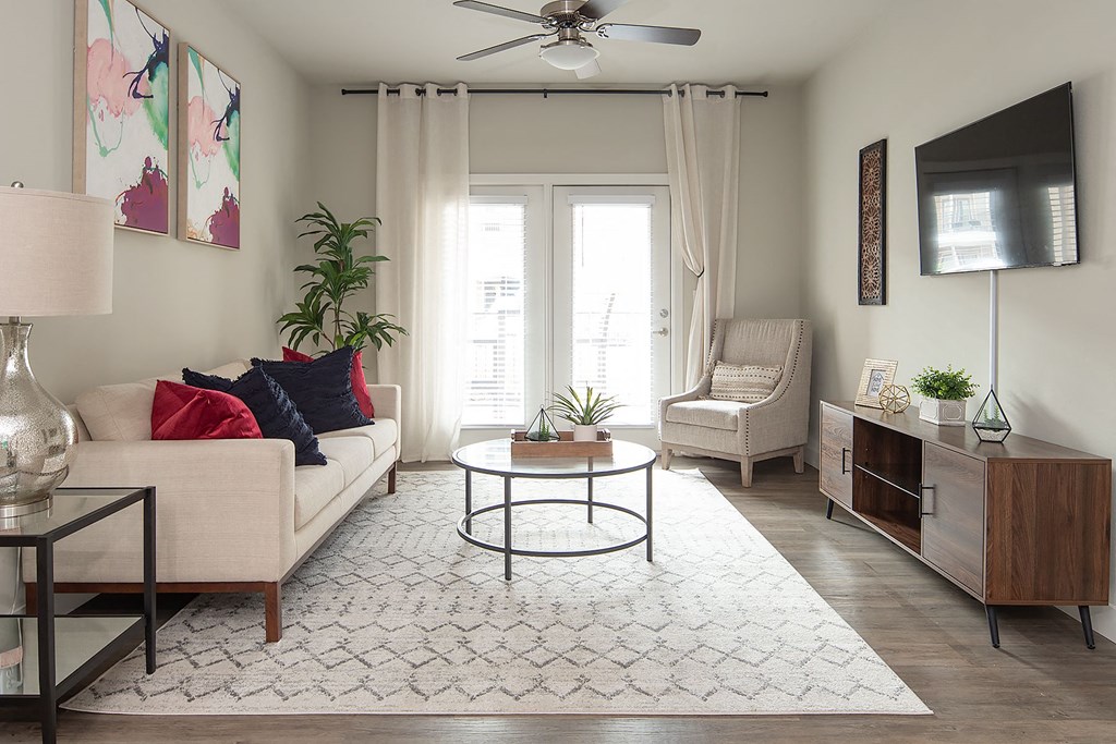 a living room with a couch and a table