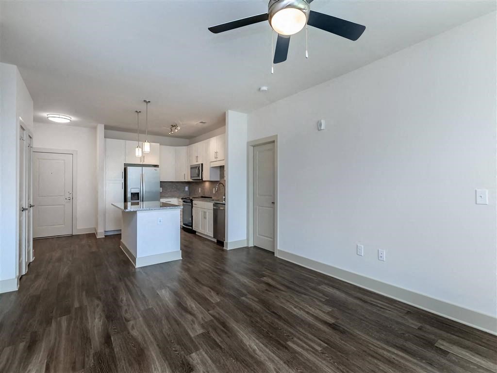 Berewick Pointe Living Room with Kitchen View in North Carolina Apartments