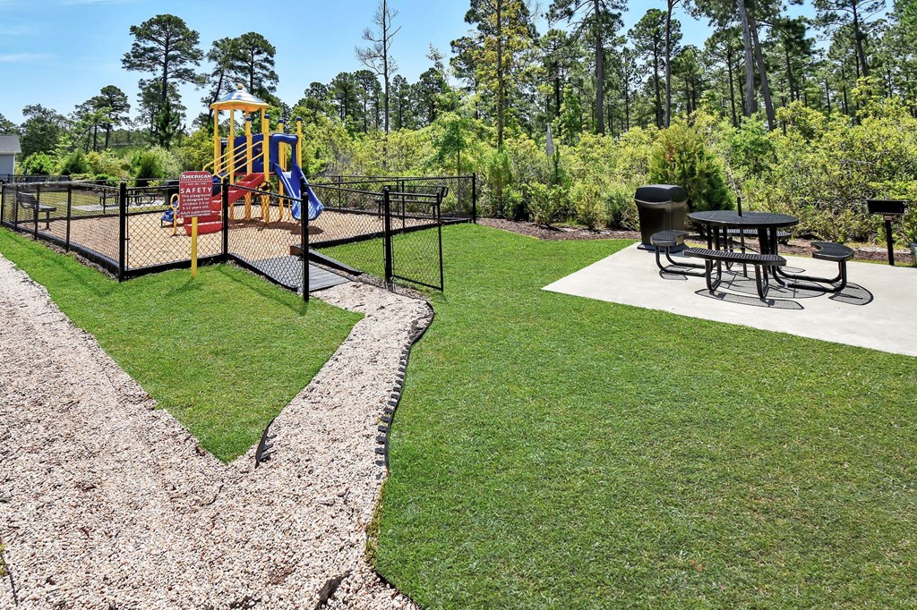 the playground at the whispering winds apartments in pearland, tx