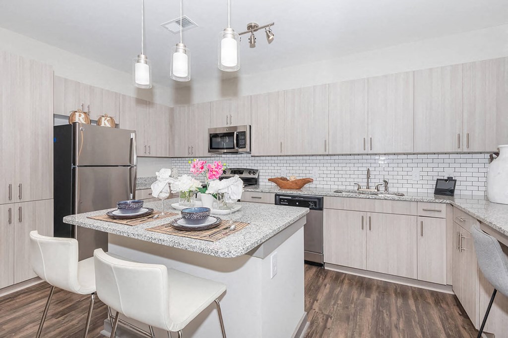 Modern Fully Equipped Kitchen at One White Oak Apartments in Cumming, GA
