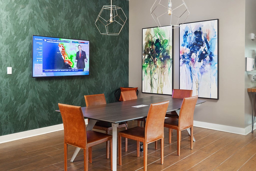 a clubhouse with a table and chairs