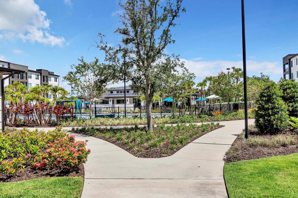 walkway with trees and plants at the central apartments near downtown minneapolis mn 55408