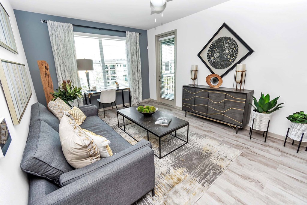 a living room with a couch and a table