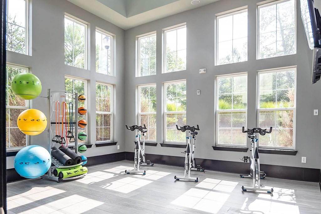 the gym with workout bikes and exercise equipment
