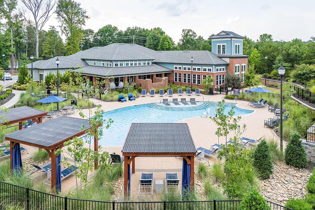 an aerial view of the resort with a swimming pool