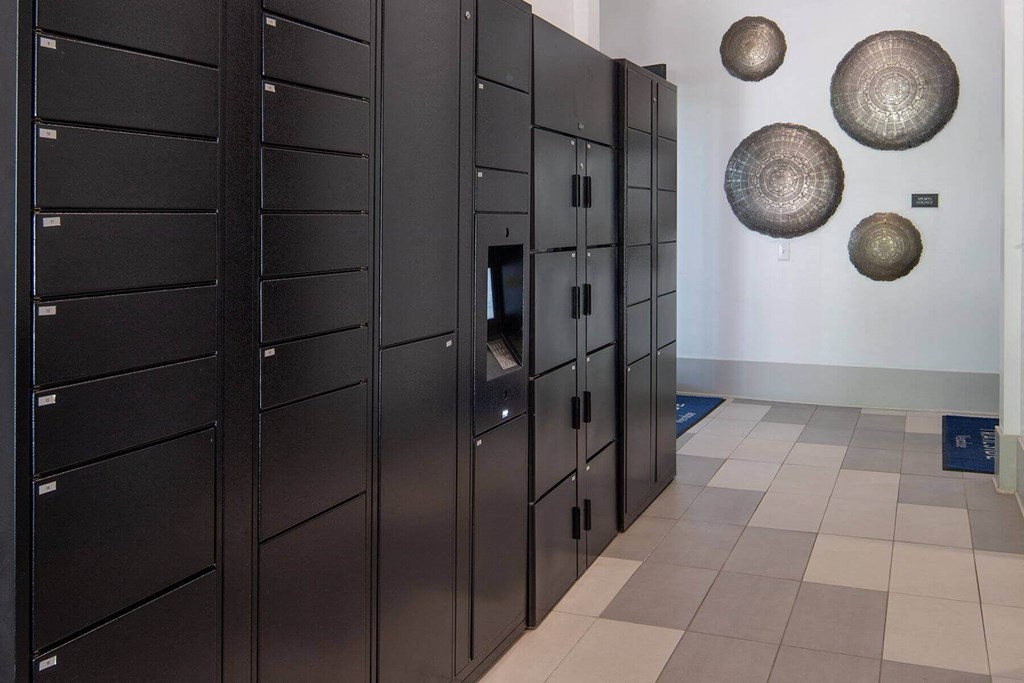 a row of lockers in a room with plates on the wall