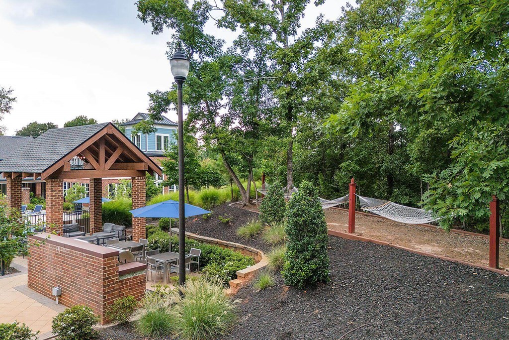 hammocks and a pavilion and trees