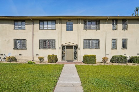 A building with a walkway in front of it.