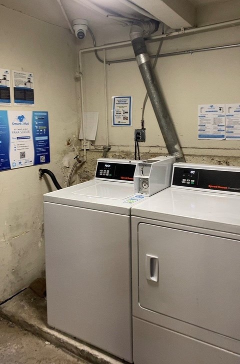 A washing machine with a digital display on top.