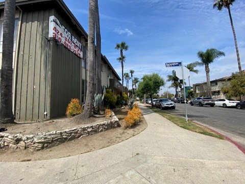 A street view with a building on the left and a sign that says "Northern".