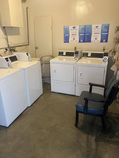 A room with a chair and some machines.