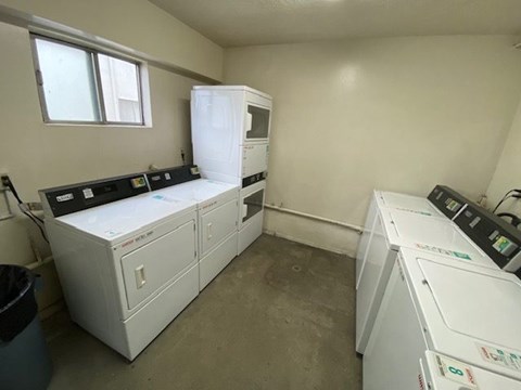A laundry room with a washer and dryer.