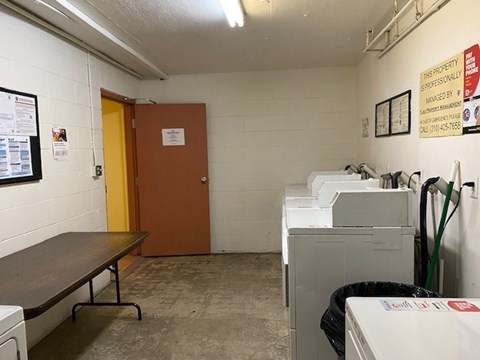 A laundry room with a washer and dryer.