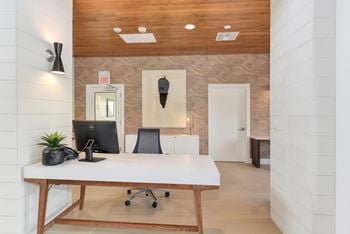 Leasing office desk area for meeting with future residents.  Desk is white with computer and desk chair.at Folsom Ranch, Folsom, CA