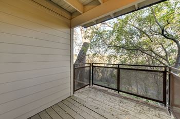 Large balcony with large oak tree branches creating privacy.at Folsom Ranch, Folsom, CA