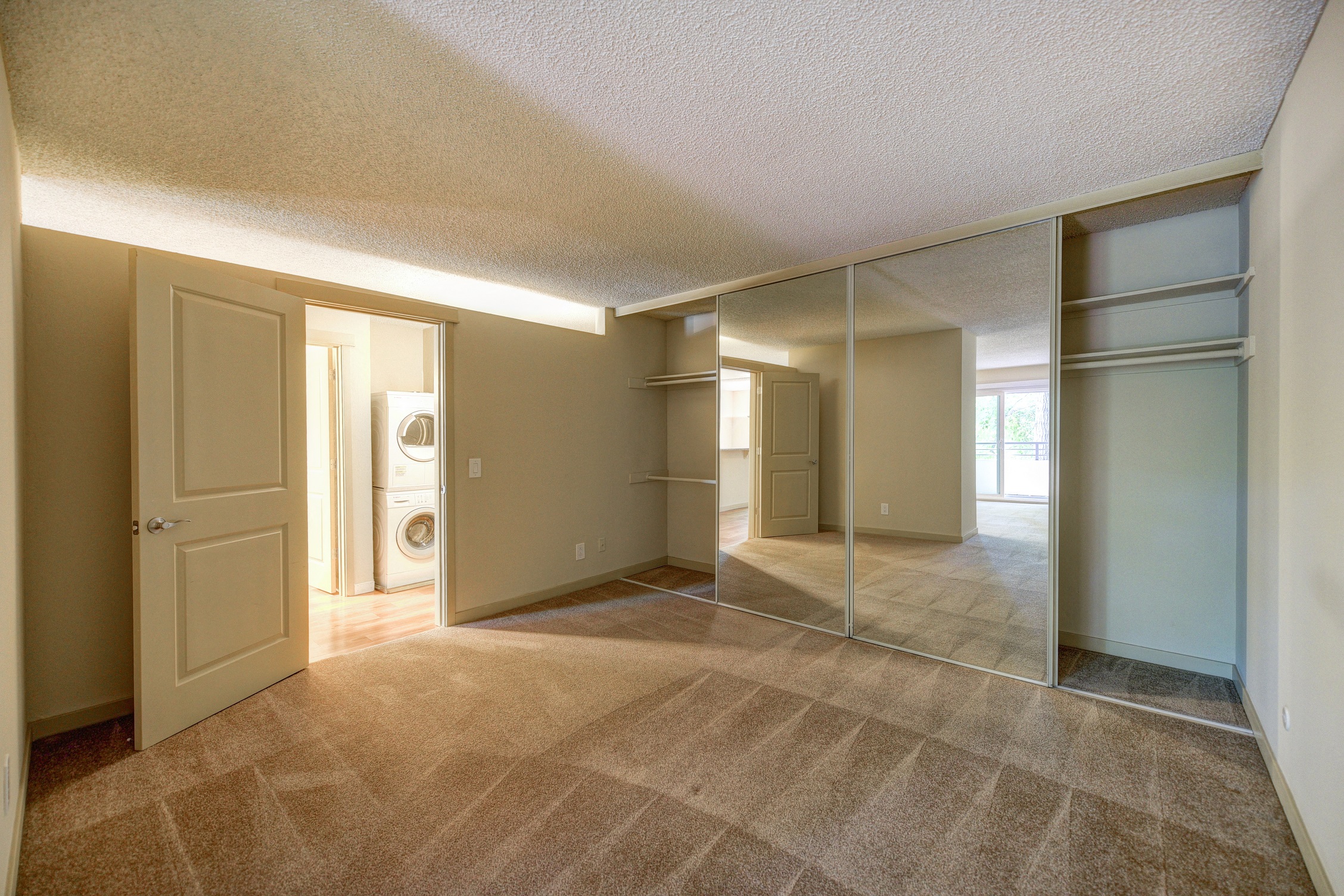 Bedroom with View of In Unit Washer Dryer at The Retreat at Walnut Creek, Walnut Creek