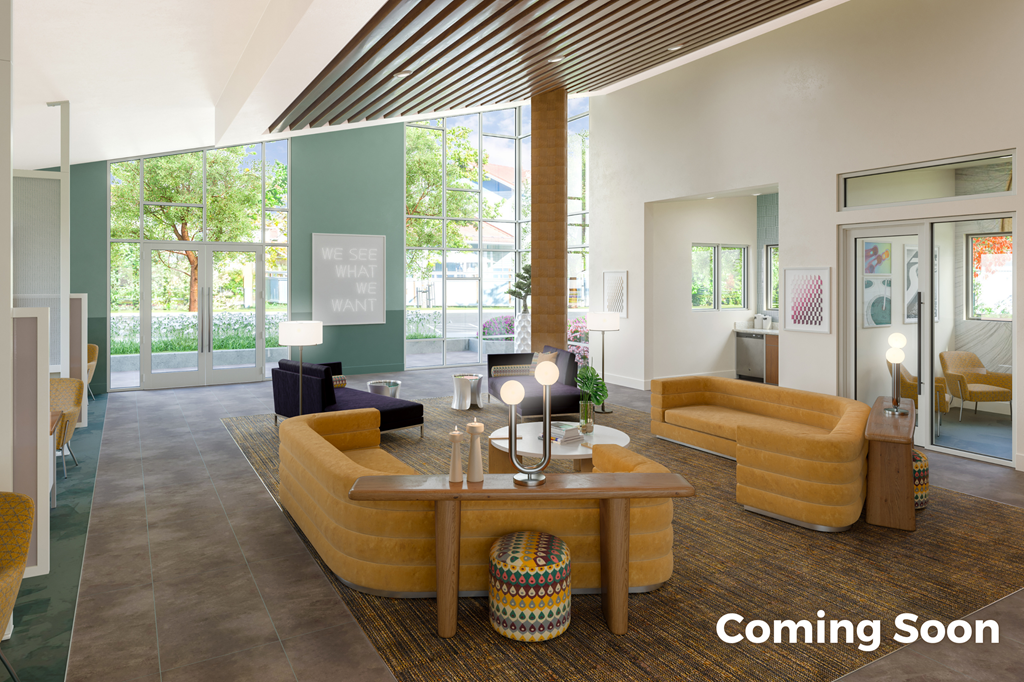 a living room with couches and a table