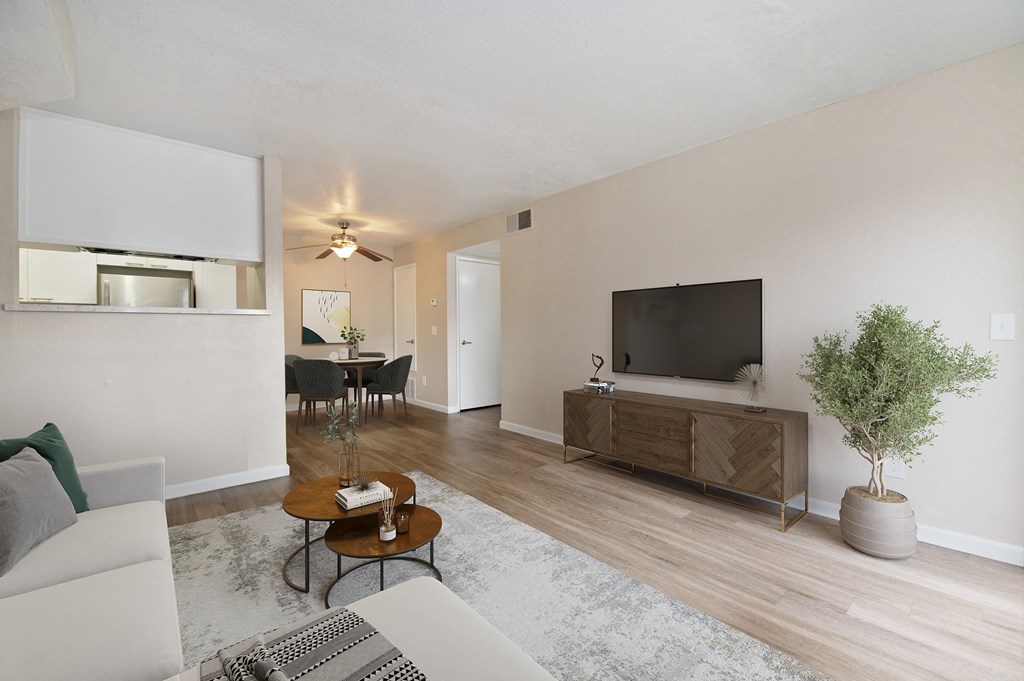 a living room with a couch and a tv