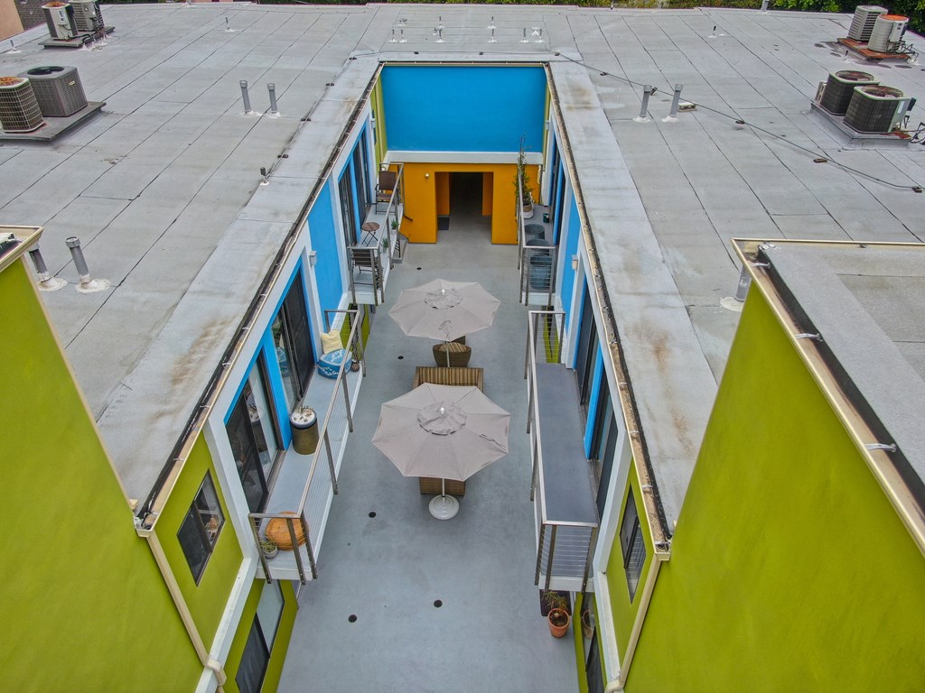 Drone photo of above the community common area in the middle of the complex at Croft Plaza Apartments, West Hollywood.