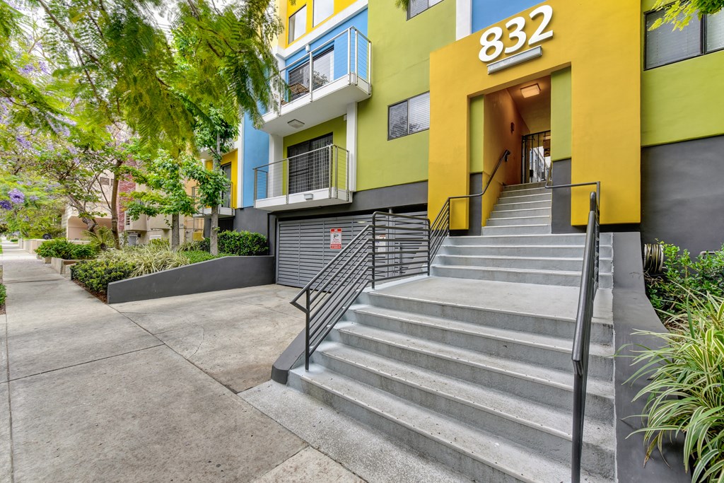 Stairway to the community entrance. At the top of the entrance are the numbers 832.at Croft Plaza Apartments, California, 90069