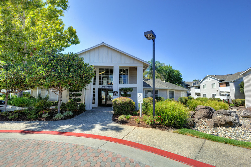 Outdoor Patio with Sidewalk, Street, Street Light, Bushes and Tress at The Legacy Apartments, Antelope, CA