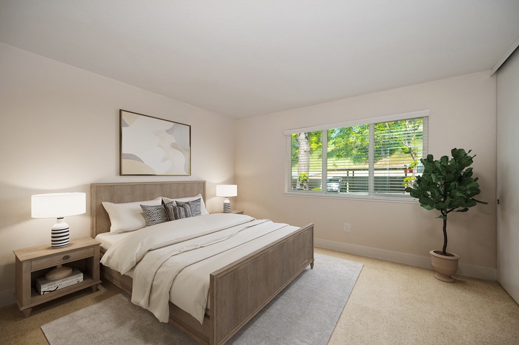a bedroom with a large bed and a window at Folsom Ranch, Folsom
