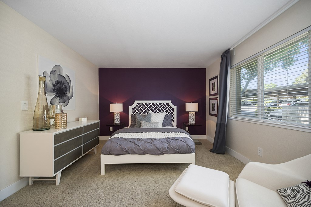 a bedroom with a bed and a dresser at Folsom Ranch, Folsom, CA