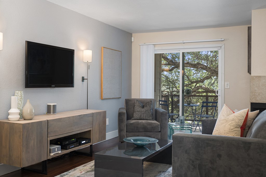 a living room with a couch and chair and a tv on the wall at Folsom Ranch, Folsom, CA, 95630