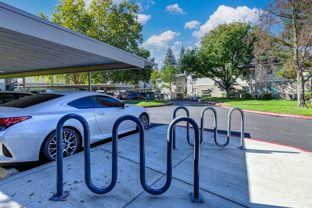 Community bike racks located though out the property.  There are two featured next to the carport parking structure. at Monte Bello Apartments, California