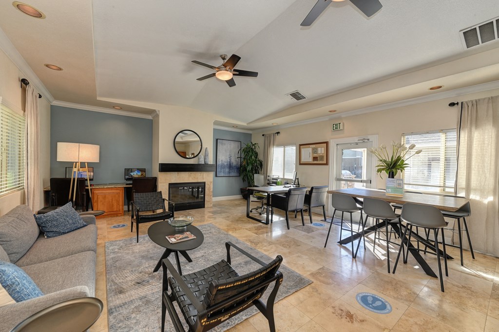 Monte Bello leasing office with seating, desks large windows and ceiling fans. at Monte Bello Apartments, Sacramento, CA