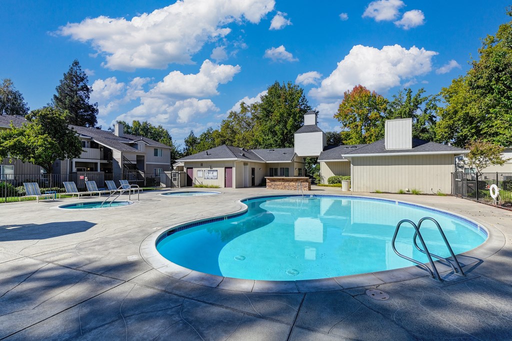 Monte Bello Swimming pool area with the spa in the distance. at Monte Bello Apartments, Sacramento