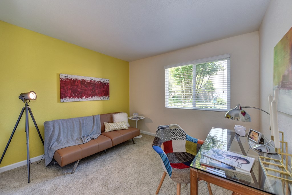 Guest Bedroom with Desk, Brown Sofa, Carpet and Window at Monte Bello Apartments, California, 95826