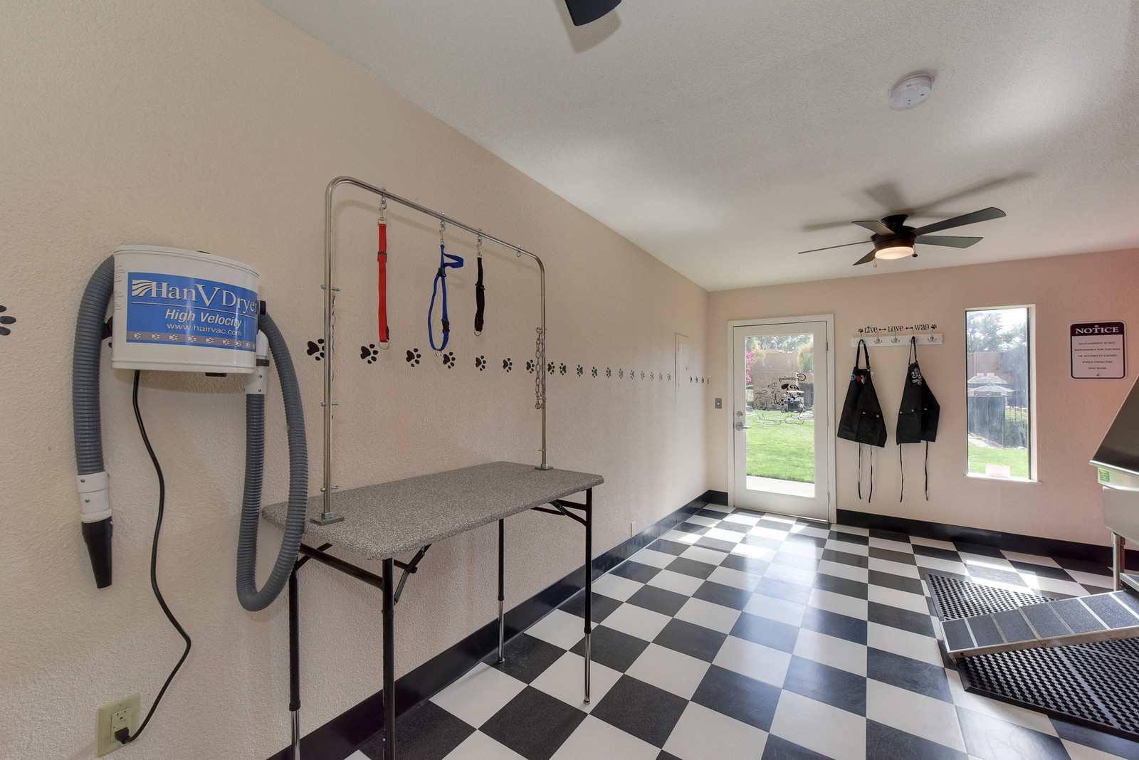 Community Pet  Washing and Grooming Area with Dog Washing Station, Black/White Checker Pattern Floor and Ceiling Facn at Fountains of Fair Oaks, California, 95628