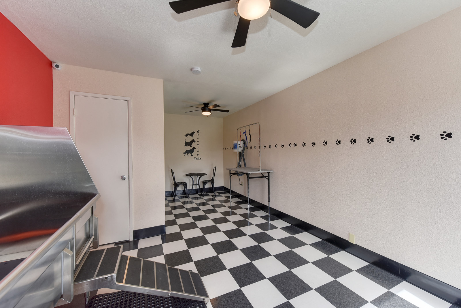 Community Pet  Washing and Grooming Area with Dog Washing Station, Black/White Checker Pattern Floor and Ceiling Facn at Fountains of Fair Oaks, California