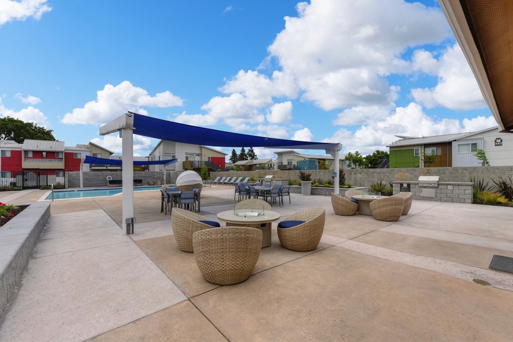 Pool and Seating Area, Fire Station, Blue/Black Seats, Blue Skies and Clouds at Addison Ranch Apartments, Petaluma