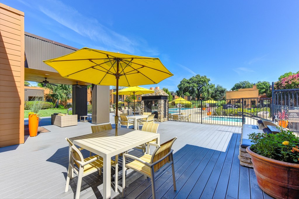 Pool Lounge  Area with Yellow Umbrellas, Grills, Gates with View of Pool at Fountains of Fair Oaks, Fair Oaks, CA 95628