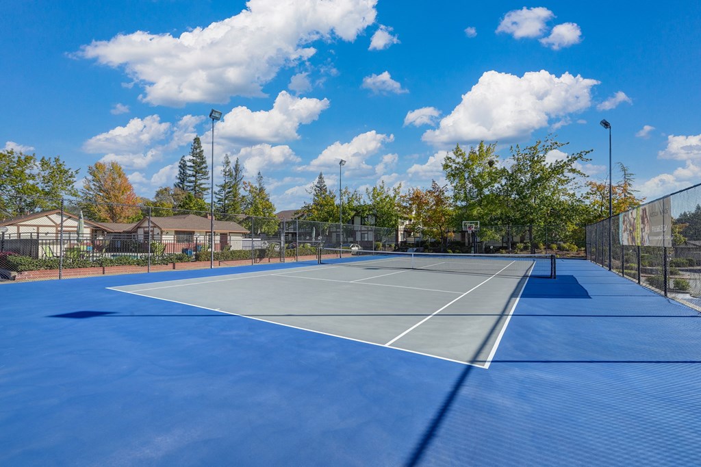 Community Sports court that is a tennis court and half court basket ball at Rocklin Manor  Apartments, California, 95677