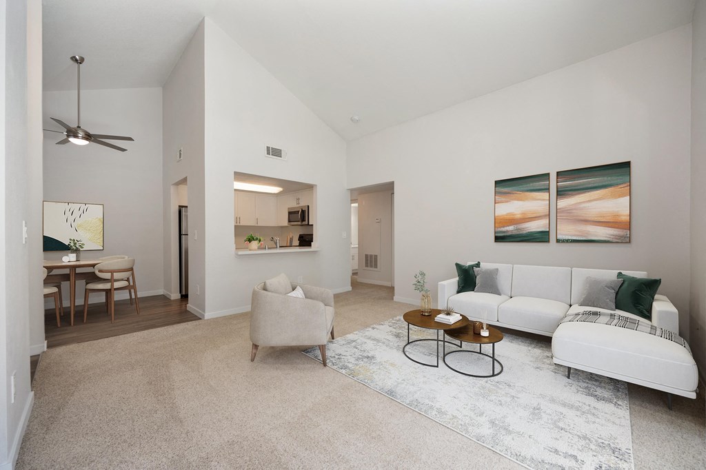 a living room with a couch and a coffee table at Rush River Apartments, Sacramento, CA